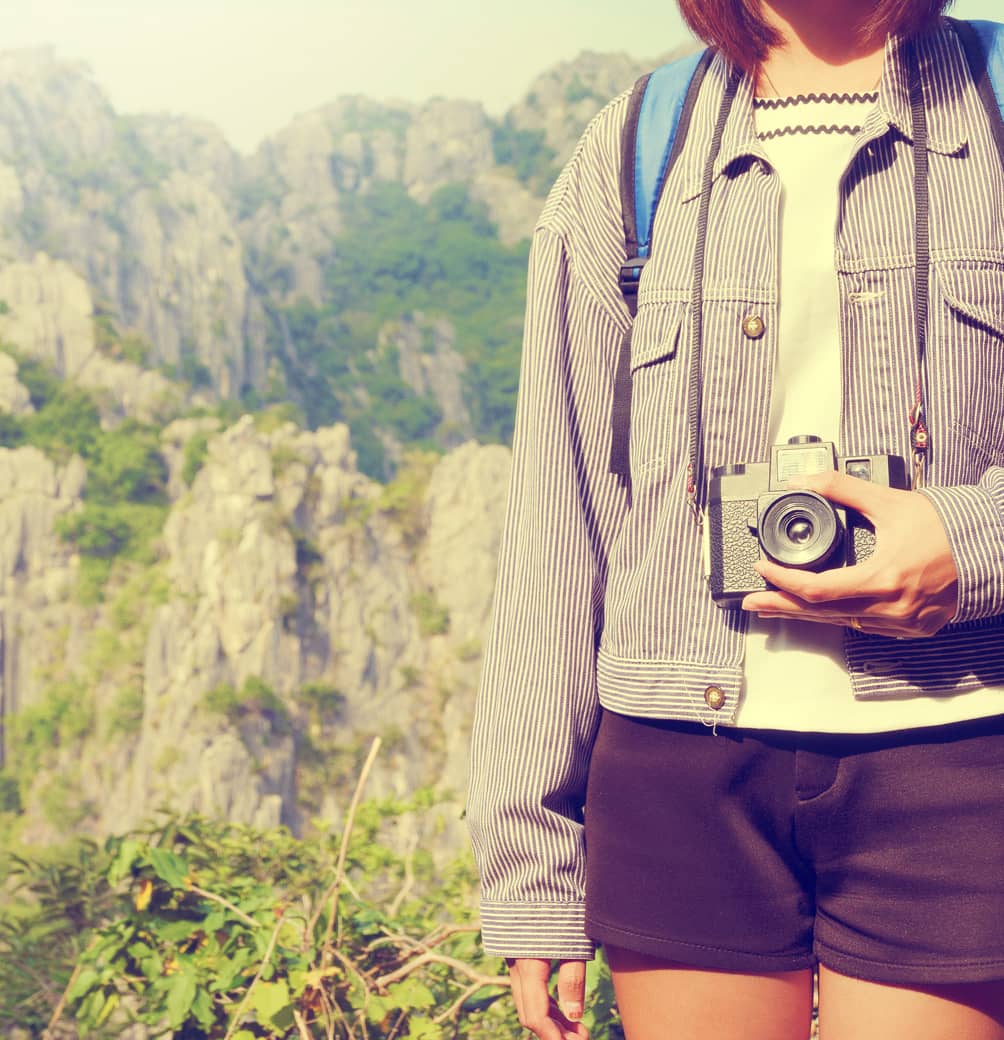 female tourist with camera